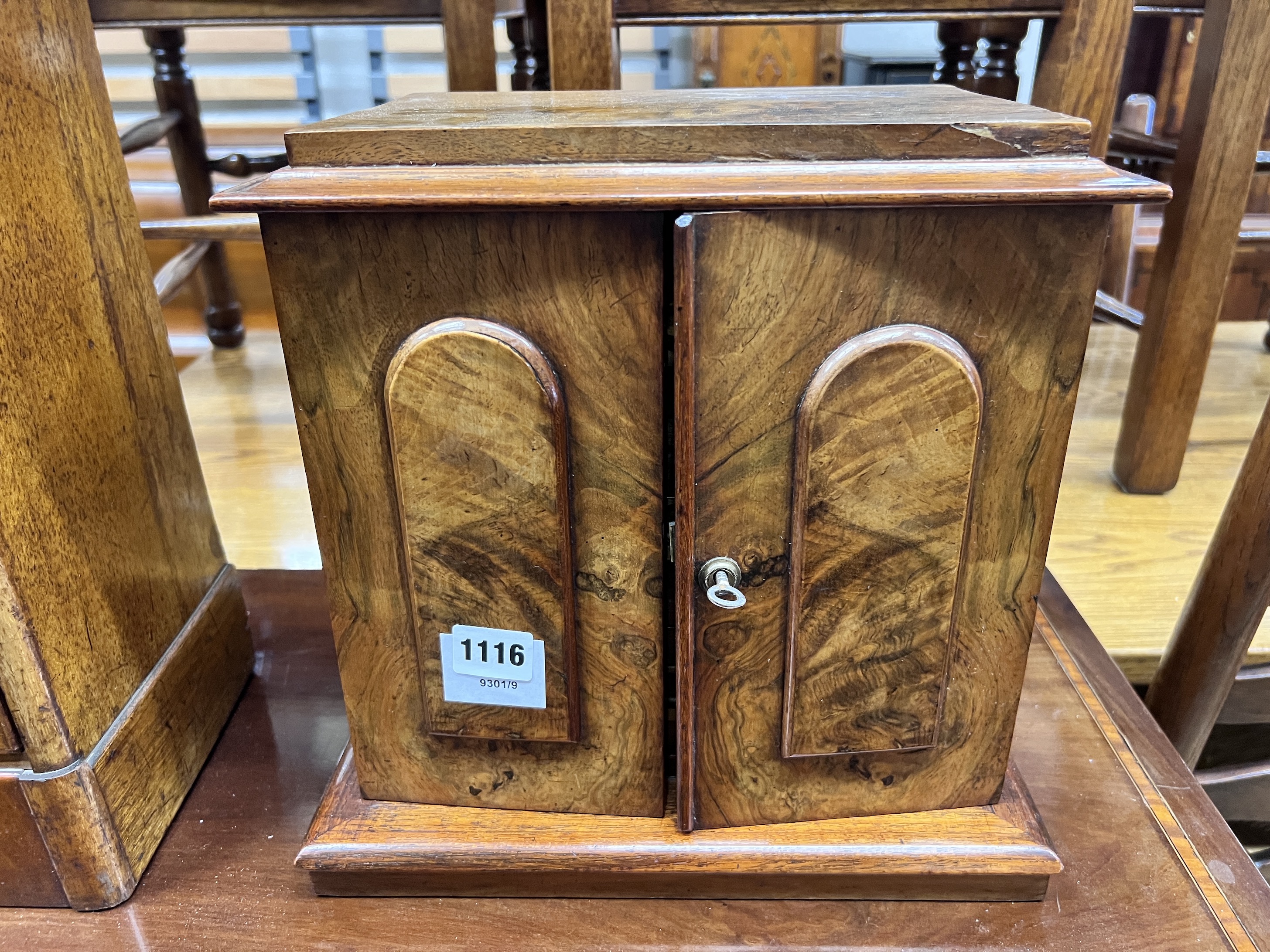 A Victorian figured walnut table cabinet fitted three drawers, width 32cm